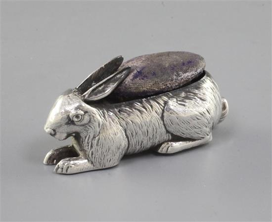 An Edwardian novelty silver pin cushion modelled as a hare by Boots Pure Drug Company, 2.25in.